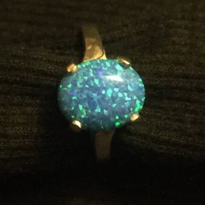 925 Silver lab created blue Opal. Sz 8